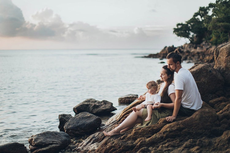 family enjoying their free time at the beach