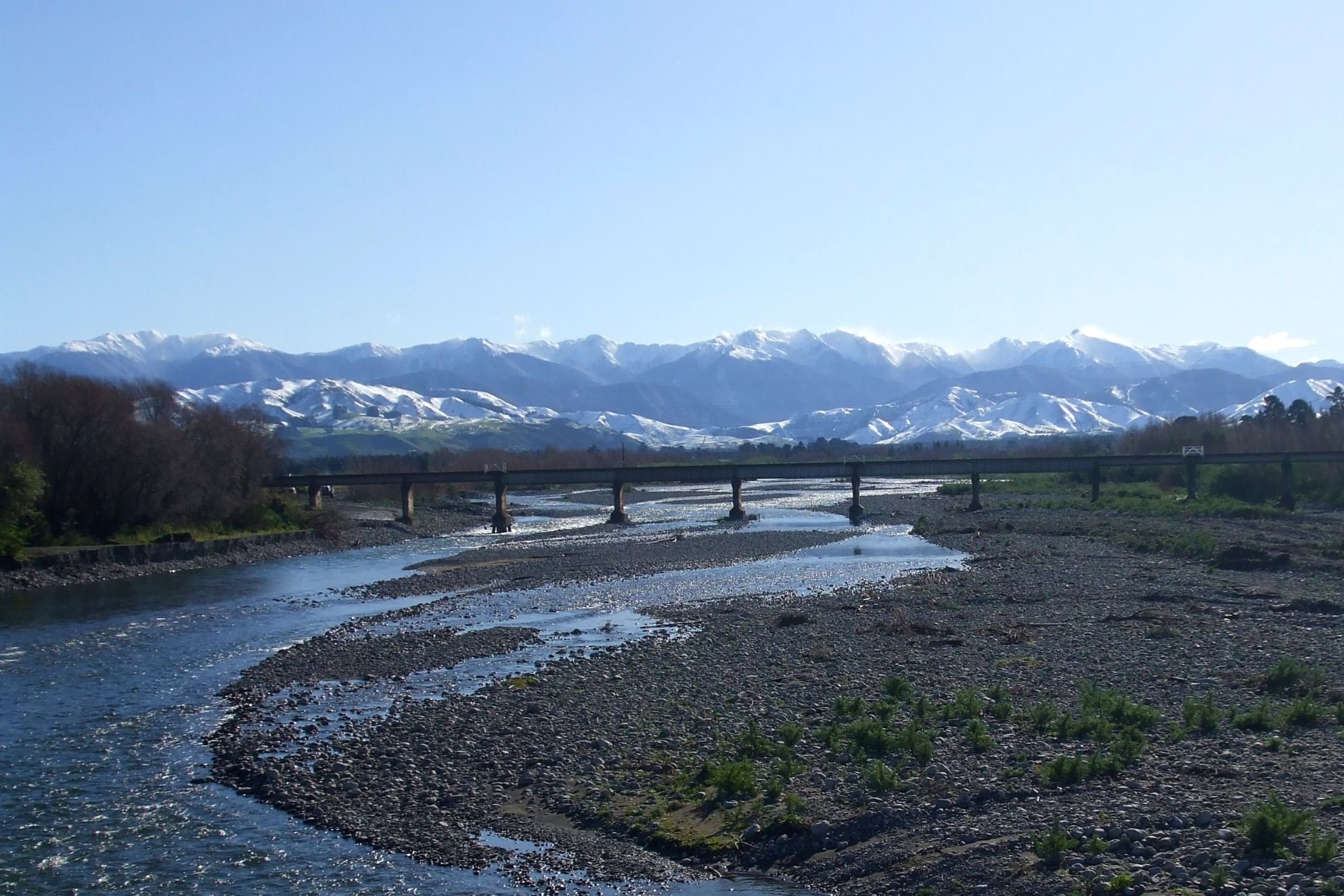 Image of lake bridge and mountains